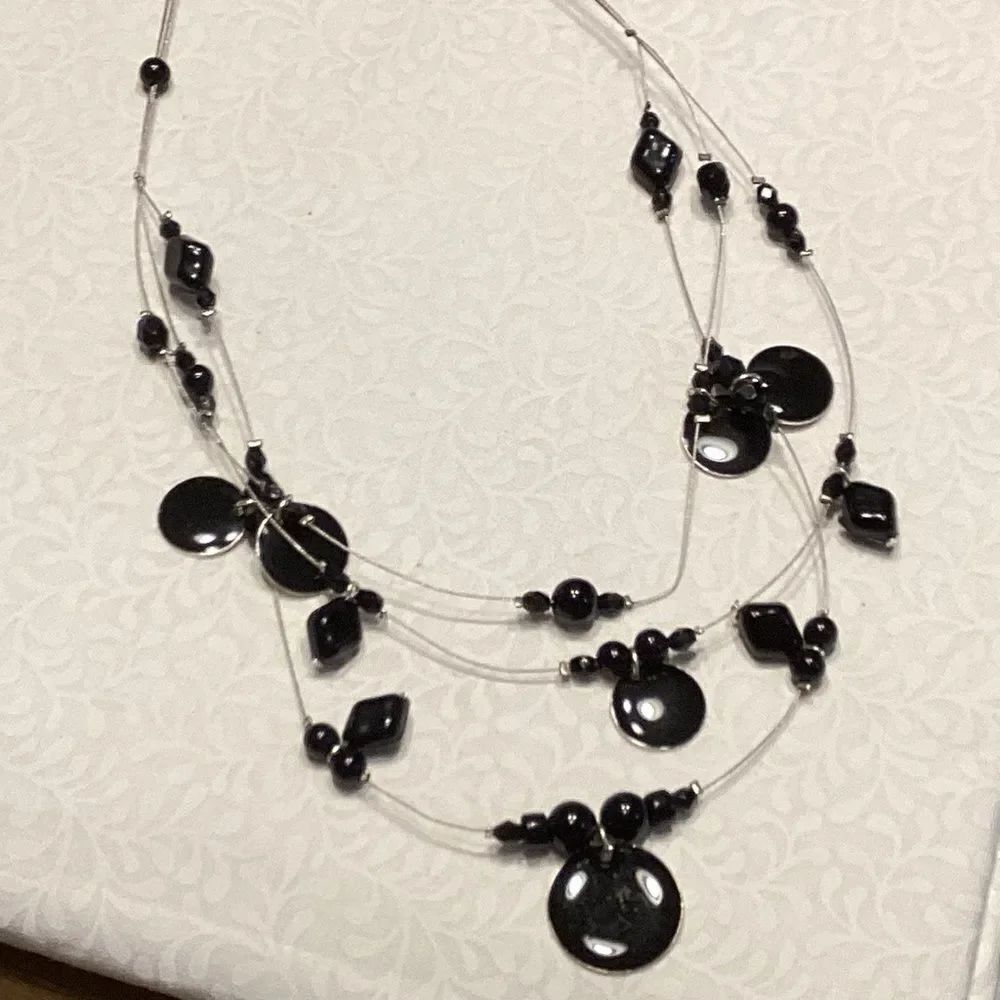 Multi-Strand Black Beaded Necklace on Silvertone Wire